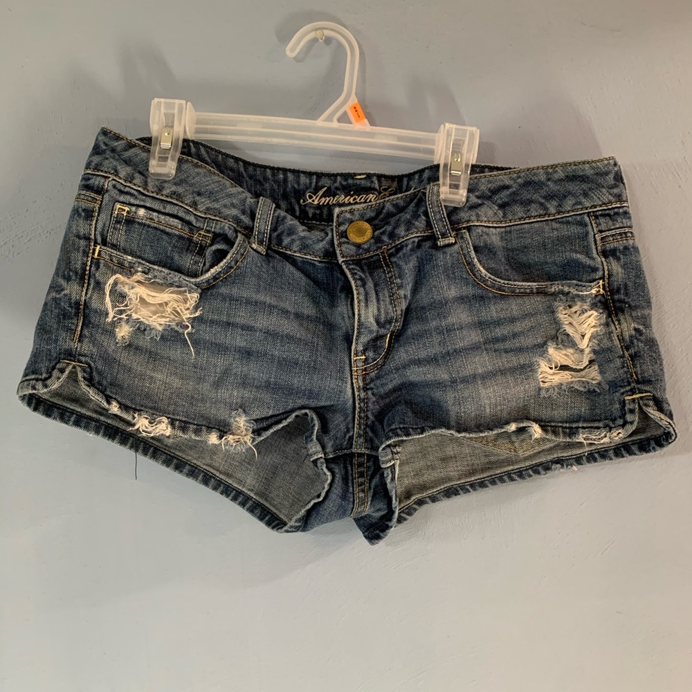 Distressed denim shorts